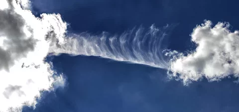 High contrast photo of clouds in a dark blue sky