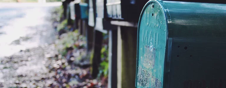 Row of American mailboxes along a road
