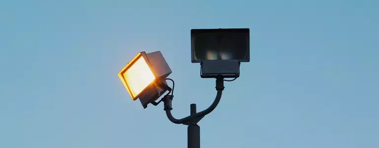 Overhead outdoor lights, one on, one off
