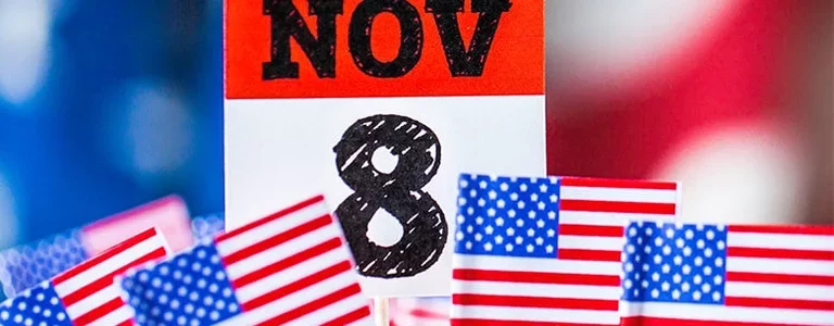 Calendar showing 'NOV 8' and American flags