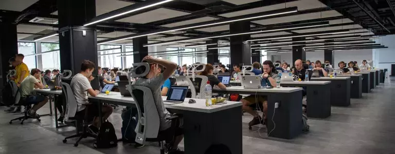 Large open office plan full of working people