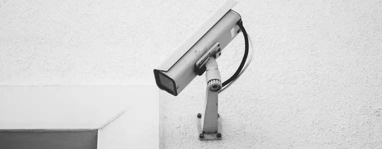 Security camera pointing down on a white wall