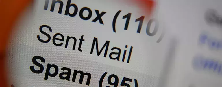Closeup of email inbox folders ‘inbox (110)’ ’sent mail’ ’spam(95)’