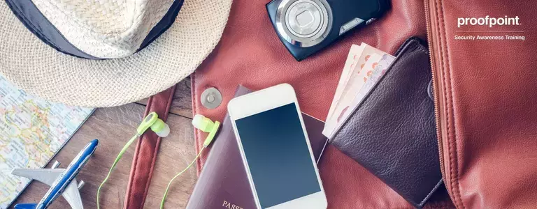 Various items required for travel laid out on a table