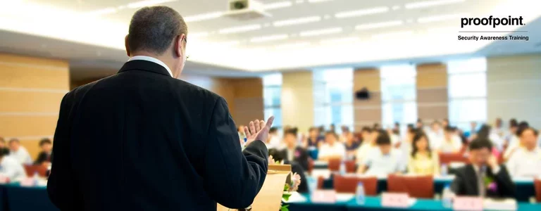 CISO giving a lecture on cybersecurity at a conference