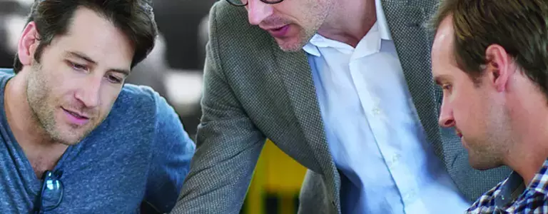 Bankers discussing steps to avoid social media regulation problems