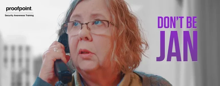'Don’t Be Jan' text over a businesswoman on the phone