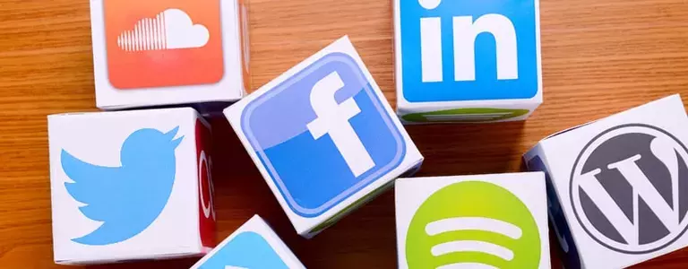 7 jumbled cubes with social media logos on them